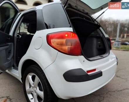 Белый Сузуки СХ4, объемом двигателя 1.6 л и пробегом 192 тыс. км за 5490 $, фото 11 на Automoto.ua