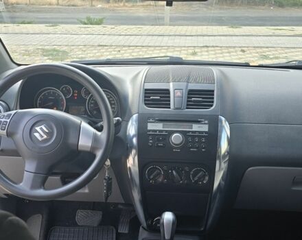 Белый Сузуки СХ4, объемом двигателя 1.6 л и пробегом 102 тыс. км за 10100 $, фото 5 на Automoto.ua