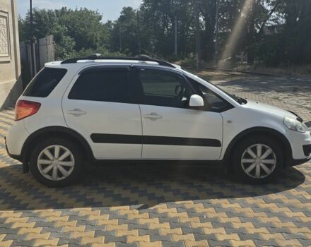 Белый Сузуки СХ4, объемом двигателя 1.6 л и пробегом 102 тыс. км за 10100 $, фото 2 на Automoto.ua