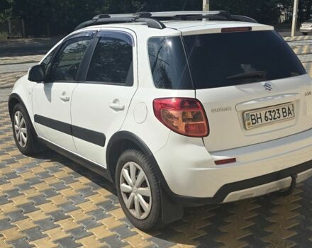 Белый Сузуки СХ4, объемом двигателя 1.6 л и пробегом 102 тыс. км за 10100 $, фото 4 на Automoto.ua