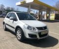Белый Сузуки СХ4, объемом двигателя 1.6 л и пробегом 100 тыс. км за 11800 $, фото 1 на Automoto.ua