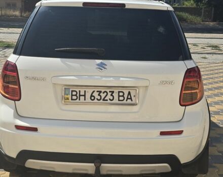 Белый Сузуки СХ4, объемом двигателя 1.6 л и пробегом 102 тыс. км за 10100 $, фото 3 на Automoto.ua