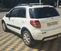 Белый Сузуки СХ4, объемом двигателя 1.6 л и пробегом 102 тыс. км за 9500 $, фото 1 на Automoto.ua