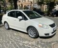 Белый Сузуки СХ4, объемом двигателя 2 л и пробегом 150 тыс. км за 5800 $, фото 1 на Automoto.ua