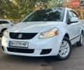 Белый Сузуки СХ4, объемом двигателя 2 л и пробегом 208 тыс. км за 7200 $, фото 1 на Automoto.ua