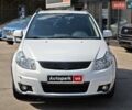 Белый Сузуки СХ4, объемом двигателя 2 л и пробегом 97 тыс. км за 5700 $, фото 1 на Automoto.ua