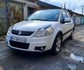 Белый Сузуки СХ4, объемом двигателя 1.6 л и пробегом 205 тыс. км за 5200 $, фото 1 на Automoto.ua