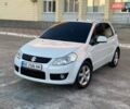 Белый Сузуки СХ4, объемом двигателя 1.59 л и пробегом 124 тыс. км за 8000 $, фото 1 на Automoto.ua