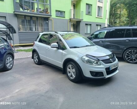 Белый Сузуки СХ4, объемом двигателя 1.6 л и пробегом 125 тыс. км за 9400 $, фото 1 на Automoto.ua