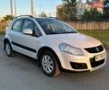 Белый Сузуки СХ4, объемом двигателя 1.6 л и пробегом 141 тыс. км за 7499 $, фото 1 на Automoto.ua