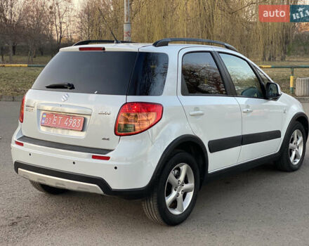 Белый Сузуки СХ4, объемом двигателя 1.6 л и пробегом 193 тыс. км за 8700 $, фото 2 на Automoto.ua