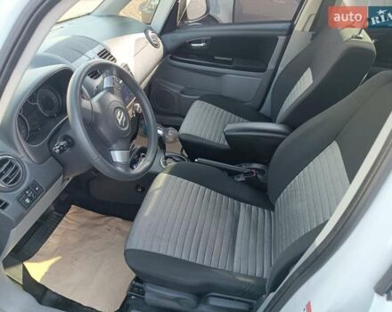 Білий Сузукі СХ4, об'ємом двигуна 1.59 л та пробігом 125 тис. км за 9459 $, фото 11 на Automoto.ua
