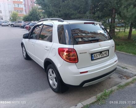 Белый Сузуки СХ4, объемом двигателя 1.6 л и пробегом 125 тыс. км за 9400 $, фото 7 на Automoto.ua
