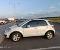 Белый Сузуки СХ4, объемом двигателя 1.6 л и пробегом 125 тыс. км за 9400 $, фото 5 на Automoto.ua