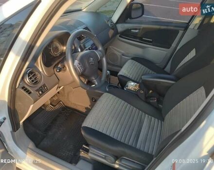 Білий Сузукі СХ4, об'ємом двигуна 1.59 л та пробігом 125 тис. км за 9459 $, фото 2 на Automoto.ua