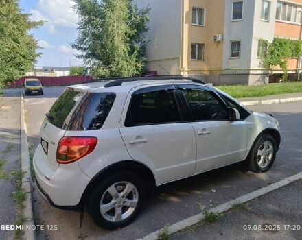 Белый Сузуки СХ4, объемом двигателя 1.6 л и пробегом 125 тыс. км за 9400 $, фото 6 на Automoto.ua
