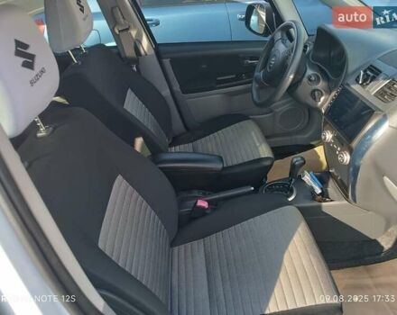 Білий Сузукі СХ4, об'ємом двигуна 1.59 л та пробігом 125 тис. км за 9459 $, фото 12 на Automoto.ua