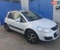 Белый Сузуки СХ4, объемом двигателя 1.6 л и пробегом 250 тыс. км за 6000 $, фото 2 на Automoto.ua