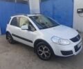 Белый Сузуки СХ4, объемом двигателя 1.6 л и пробегом 250 тыс. км за 5800 $, фото 2 на Automoto.ua