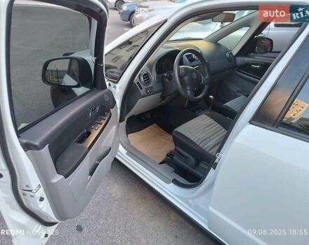 Білий Сузукі СХ4, об'ємом двигуна 1.59 л та пробігом 125 тис. км за 9459 $, фото 14 на Automoto.ua