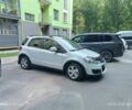 Белый Сузуки СХ4, объемом двигателя 1.6 л и пробегом 125 тыс. км за 9400 $, фото 1 на Automoto.ua