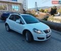 Белый Сузуки СХ4, объемом двигателя 2 л и пробегом 237 тыс. км за 8800 $, фото 1 на Automoto.ua
