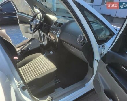 Белый Сузуки СХ4, объемом двигателя 1.6 л и пробегом 130 тыс. км за 9000 $, фото 8 на Automoto.ua