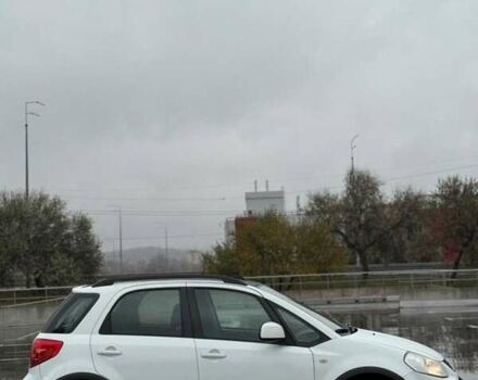 Белый Сузуки СХ4, объемом двигателя 1.59 л и пробегом 176 тыс. км за 7500 $, фото 1 на Automoto.ua