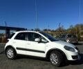 Белый Сузуки СХ4, объемом двигателя 1.6 л и пробегом 125 тыс. км за 9500 $, фото 1 на Automoto.ua