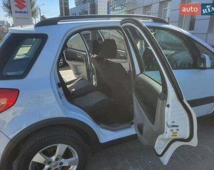 Белый Сузуки СХ4, объемом двигателя 1.6 л и пробегом 130 тыс. км за 9000 $, фото 7 на Automoto.ua