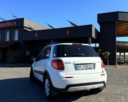 Белый Сузуки СХ4, объемом двигателя 1.6 л и пробегом 125 тыс. км за 9500 $, фото 2 на Automoto.ua