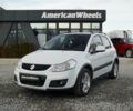 Белый Сузуки СХ4, объемом двигателя 1.6 л и пробегом 172 тыс. км за 9900 $, фото 1 на Automoto.ua