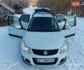 Белый Сузуки СХ4, объемом двигателя 1.6 л и пробегом 193 тыс. км за 8300 $, фото 1 на Automoto.ua
