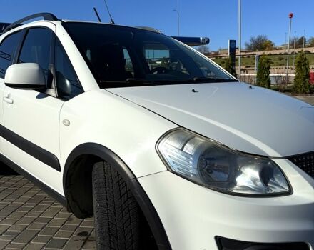 Белый Сузуки СХ4, объемом двигателя 1.6 л и пробегом 125 тыс. км за 9500 $, фото 4 на Automoto.ua