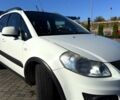 Белый Сузуки СХ4, объемом двигателя 1.6 л и пробегом 125 тыс. км за 9500 $, фото 4 на Automoto.ua