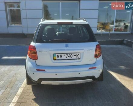 Белый Сузуки СХ4, объемом двигателя 1.6 л и пробегом 130 тыс. км за 9000 $, фото 3 на Automoto.ua
