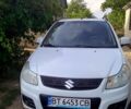 Белый Сузуки СХ4, объемом двигателя 1.6 л и пробегом 70 тыс. км за 9000 $, фото 1 на Automoto.ua