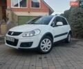 Белый Сузуки СХ4, объемом двигателя 1.59 л и пробегом 103 тыс. км за 8900 $, фото 1 на Automoto.ua