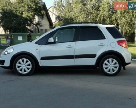 Белый Сузуки СХ4, объемом двигателя 1.6 л и пробегом 125 тыс. км за 9900 $, фото 8 на Automoto.ua