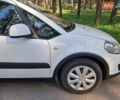 Белый Сузуки СХ4, объемом двигателя 1.59 л и пробегом 87 тыс. км за 12300 $, фото 2 на Automoto.ua