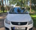 Белый Сузуки СХ4, объемом двигателя 1.59 л и пробегом 87 тыс. км за 12300 $, фото 1 на Automoto.ua