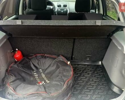 Белый Сузуки СХ4, объемом двигателя 1.6 л и пробегом 98 тыс. км за 11000 $, фото 5 на Automoto.ua