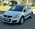 Белый Сузуки СХ4, объемом двигателя 1.6 л и пробегом 125 тыс. км за 9900 $, фото 4 на Automoto.ua