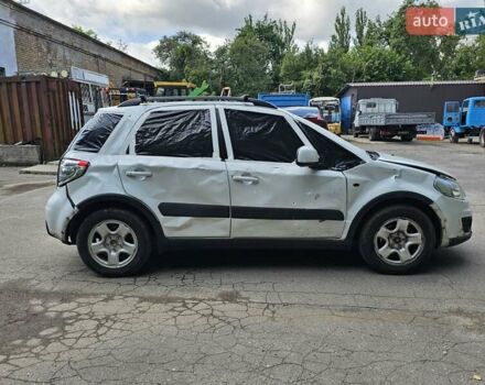 Белый Сузуки СХ4, объемом двигателя 1.59 л и пробегом 100 тыс. км за 4000 $, фото 2 на Automoto.ua