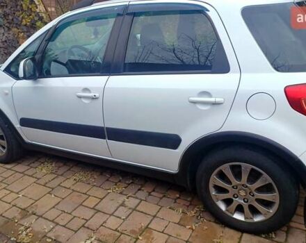 Белый Сузуки СХ4, объемом двигателя 1.6 л и пробегом 98 тыс. км за 11000 $, фото 3 на Automoto.ua