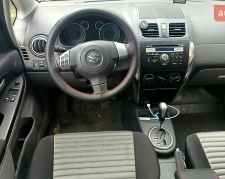 Белый Сузуки СХ4, объемом двигателя 1.6 л и пробегом 98 тыс. км за 11000 $, фото 7 на Automoto.ua