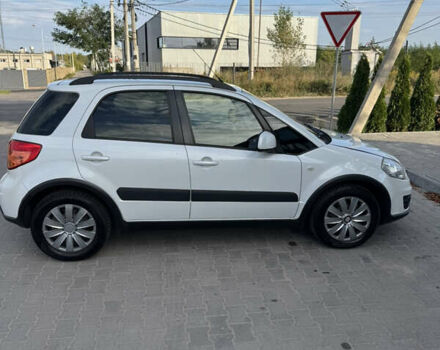 Белый Сузуки СХ4, объемом двигателя 1.59 л и пробегом 134 тыс. км за 9800 $, фото 3 на Automoto.ua