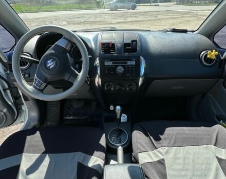 Белый Сузуки СХ4, объемом двигателя 1.6 л и пробегом 124 тыс. км за 8600 $, фото 18 на Automoto.ua