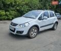Белый Сузуки СХ4, объемом двигателя 1.59 л и пробегом 100 тыс. км за 4000 $, фото 1 на Automoto.ua