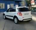 Белый Сузуки СХ4, объемом двигателя 1.6 л и пробегом 125 тыс. км за 9900 $, фото 10 на Automoto.ua